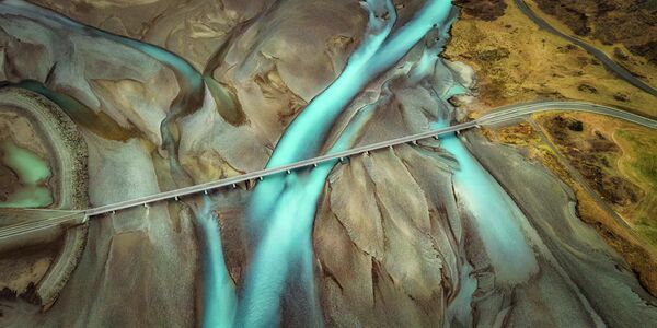 Снимок &quot;Исландский мост&quot; испанского фотографа Карлоса Солиниса Камалича - Sputnik Грузия