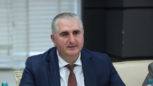 Министр финансов Грузии Лаша Хуцишвили и региональный директор Международной финансовой корпорации (IFC) в Европе Рана Карадше - Sputnik Грузия