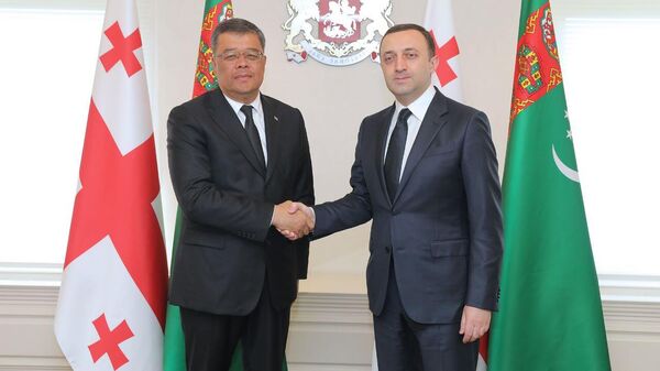 Ираклий Гарибашвили и министр торговли и экономики Туркменистана Бегенч Гочмоллаев - Sputnik Грузия