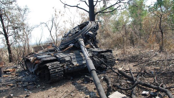Уничтоженный танк украинской армии, фото из архива - Sputnik Грузия