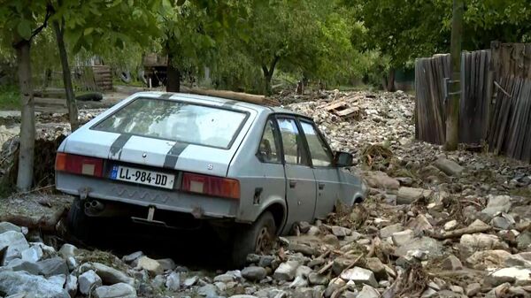 Разрушенные дороги и инфраструктура в регионе Шида Картли - видео - Sputnik Грузия