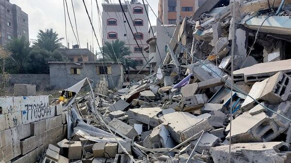 Обломки зданий, разрушенных в результате ракетных ударов ВС Израиля по Газе - Sputnik Грузия