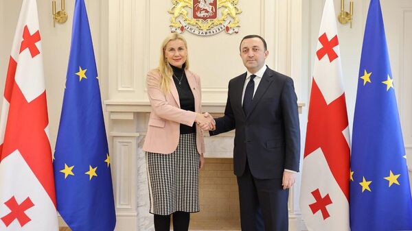 Ираклий Гарибашвили и еврокомиссар по вопросам энергетики Кадри Симсон - Sputnik Грузия