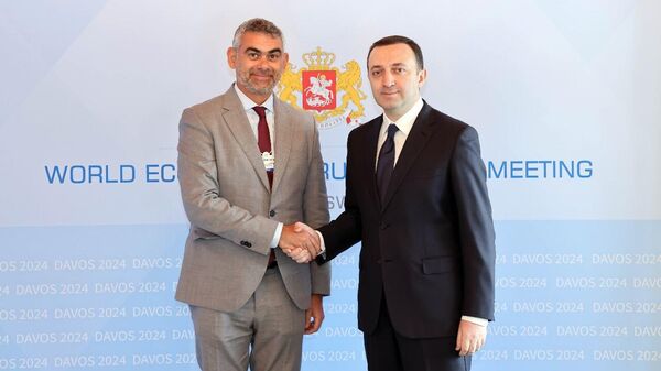 Премьер-министр Грузии Ираклия Гарибашвили с главой инвестиционной компанией  TAQA Ясимом Хусейном Ахмедом Табетом - Sputnik Грузия