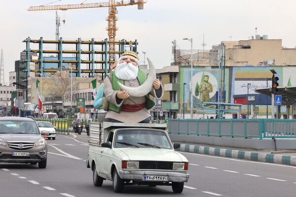 Праздничный Тегеран в канун Навруза. - Sputnik Грузия