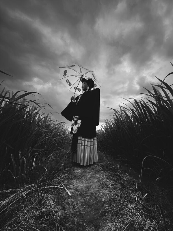 Снимок фотографа из Китая Чжан Сяоцзюнь, высоко оцененный в категории Portrait конкурса IPPAWARDS 2025. - Sputnik Грузия