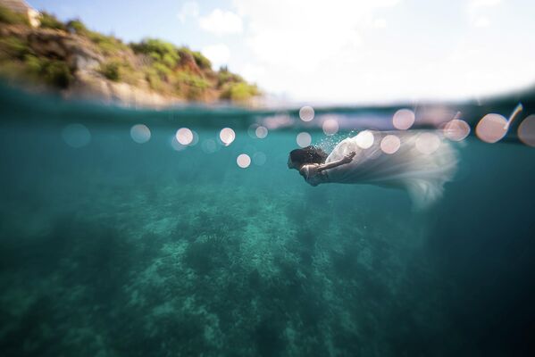 Снимок фотографа Нестора Заварце, попавший в финал номинации "Нарушай правила". - Sputnik Грузия