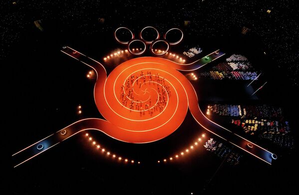 ეს იყო ოლიმპიური თამაშების გახსნის პირველი ცერემონია, რომელიც ერთდროულად რამდენიმე ადგილას გაიმართა. - Sputnik საქართველო