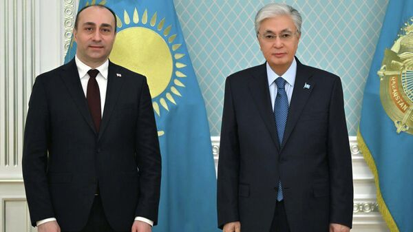 Министр внутренних дел Грузии Гека Геладзе на встрече с президентом Казахстана Касым-Жомартом Токаевым - Sputnik Грузия