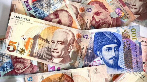 Не оправдал прогнозов: почему грузинский лари не обвалился?
 - Sputnik Грузия