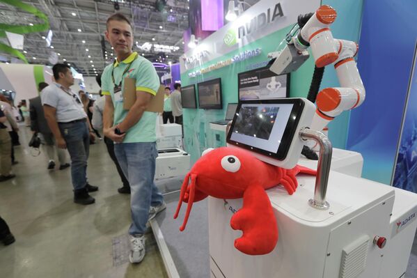 На выставке Computex Taipei, одной из крупнейших в мире выставок компьютерной техники и технологий, в Тайбэе, Тайвань. - Sputnik Грузия
