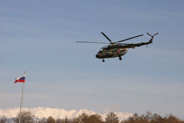 военный вертолет 7-й базы на полигоне в Очамчира (Абхазия, оккупированный регион Грузии). 2009 год. - Sputnik Грузия