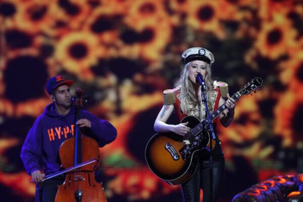 Участники конкурса Евровидение -2012 от Исландии, дуэт Грета Саломе и Джонси на сцене комплекса Baku Crystal Hall в Баку. - Sputnik Грузия