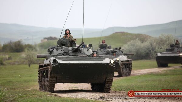 Вооруженные силы Грузии на учениях были представлены ротой Альфа 12-го батальона первой пехотной бригады, первой механизированной ротой 42-го батальона четвертой механизированной бригады и взводом военной полиции. - Sputnik Грузия