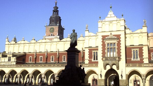 Памятник польскому поэту Адаму Мицкевичу на площади Главного Рынка в городе Кракове - Sputnik Грузия