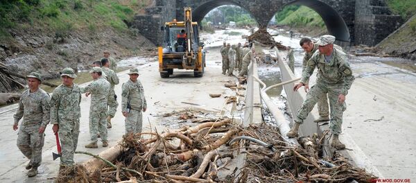 Ликвидация последствий наводнения Ликвидация последствий наводнения - Sputnik Грузия