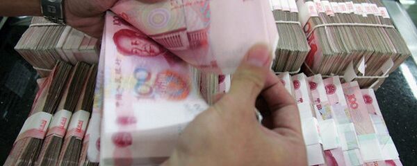 Китайские юани. Архивное фото Китайские юани. Архивное фото - Sputnik Грузия