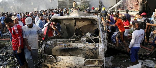 Последствия взрыва на рынке Багдада - Sputnik Грузия