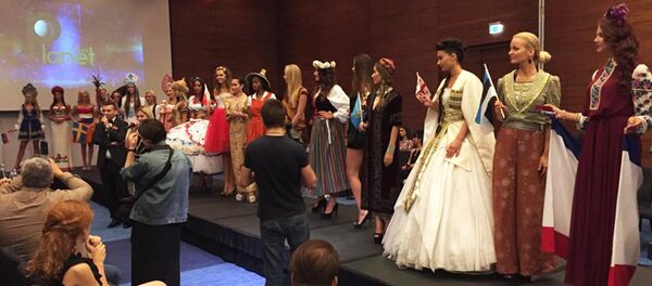 Красавицы в национальной одежде: конкурс “Мисс Планета” в Тбилиси - Sputnik Грузия