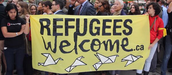 მიგრანტთა მხარდასაჭერი მიტინგი კანადაში - Sputnik საქართველო