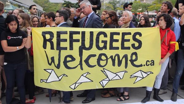 Добро пожаловать, беженцы – канадцы митинговали в защиту мигрантов - Sputnik Грузия
