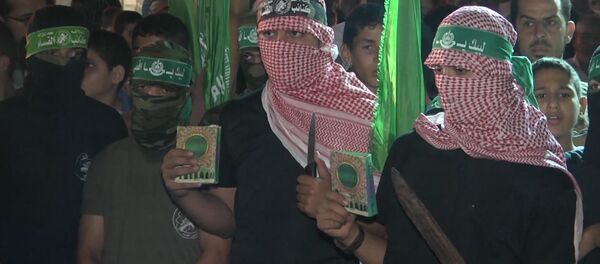 Палестинцы с ножами митинговали против израильской полиции в Газе Палестинцы с ножами митинговали против израильской полиции в Газе - Sputnik Грузия