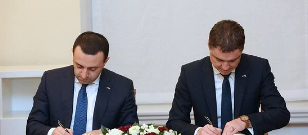 Премьер-министры Эстонии и Грузии Таави Рыйвас и Ираклий Гарибашвили - Sputnik Грузия