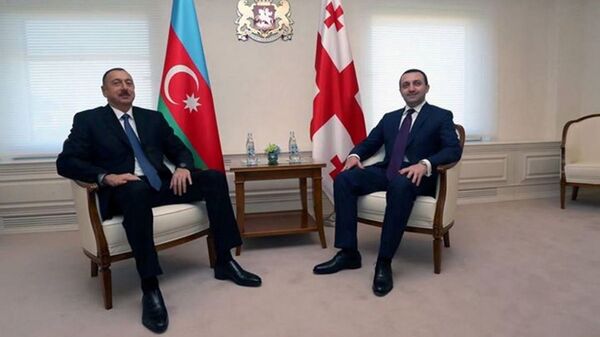 Премьер Грузии Ираклий Гарибашвили и президент Азербайджана Ильхам Алиев - Sputnik Грузия