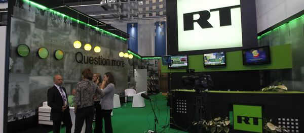 Стенд канала Russia Today - Sputnik Грузия