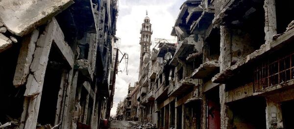 Разрушенные здания в сирийском городе Хомсе. - Sputnik Грузия