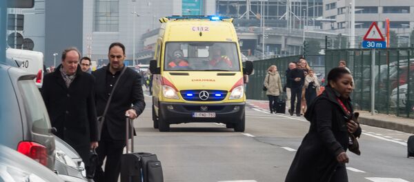 აფეთქების შემდეგ ადამიანები ბრიუსელის საერთაშორისო აეროპორტს ტოვებენ აფეთქების შემდეგ ადამიანები ბრიუსელის საერთაშორისო აეროპორტს ტოვებენ - Sputnik საქართველო