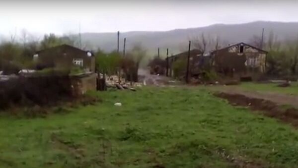Карабахский конфликт. Кадры из зоны боевых действий - Sputnik Грузия