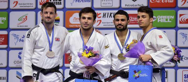 Важа Маргвелашвили (Грузия) - золотая медаль (второй слева) - Sputnik Грузия