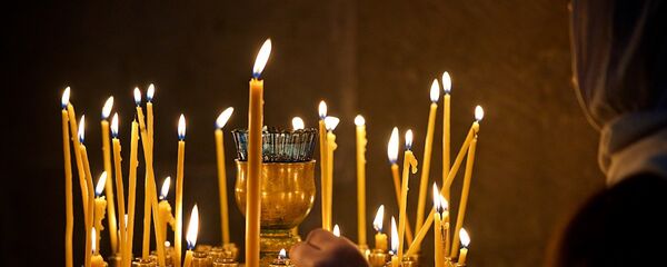 ეკლესიაში დანთებული სანთლები ეკლესიაში დანთებული სანთლები - Sputnik საქართველო