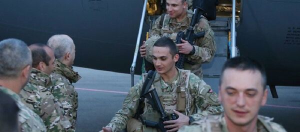 Грузинские военные вернулись из Афганистана Грузинские военные вернулись из Афганистана - Sputnik Грузия