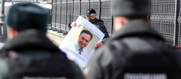 Акция против полицейского произвола в деле Магнитского - Sputnik Грузия