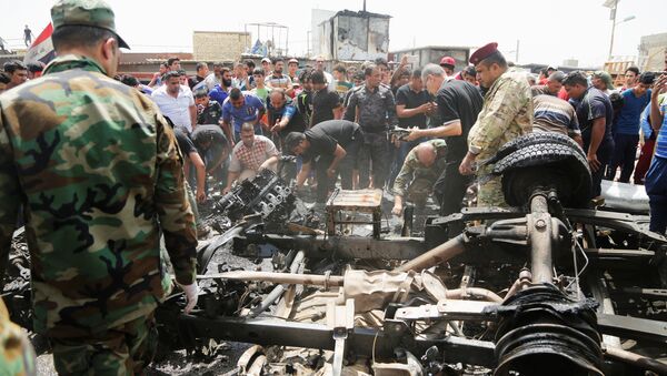 Взрыв бомбы в шиитском районе в Багдаде, Ирак - Sputnik Грузия