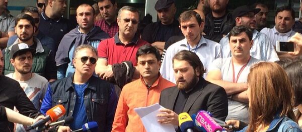 Сотрудники Первого канала ОВГ зачитали петицию - Sputnik Грузия