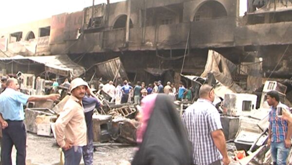 Последствия взрыва в Багдаде: разрушенный рынок и искореженные машины - Sputnik Грузия