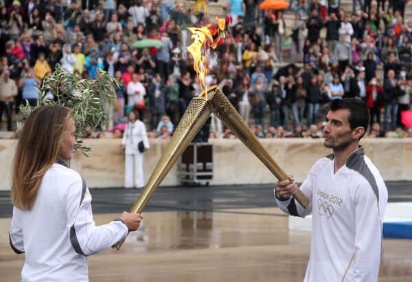 Церемония передачи Олимпийского огня оргкомитету Олимпиады 2012 - Sputnik Грузия