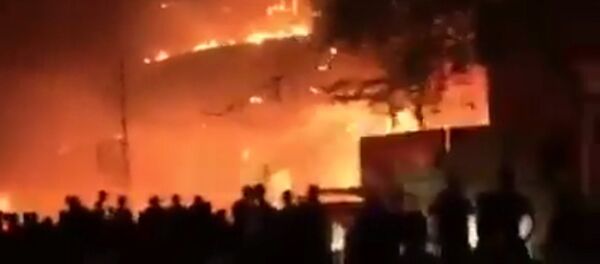 ბაღდადში ტერორისტების თავდასხმის შედეგად შენობა ცეცხლის ალში გაეხვია ბაღდადში ტერორისტების თავდასხმის შედეგად შენობა ცეცხლის ალში გაეხვია - Sputnik საქართველო