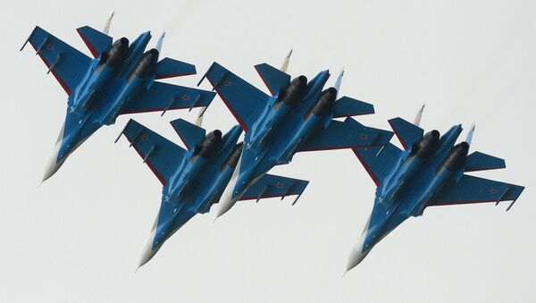 Многоцелевые истребители Су-27 пилотажной группы Русские Витязи - Sputnik Грузия