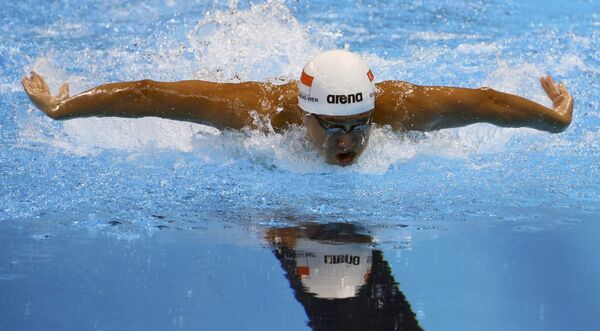 Спортсмен из Сингапура Куа Чжэн Вень во время полуфинала по плаванию на Олимпийских играх в Рио. Заплыв на 100 метров баттерфляем. - Sputnik Грузия