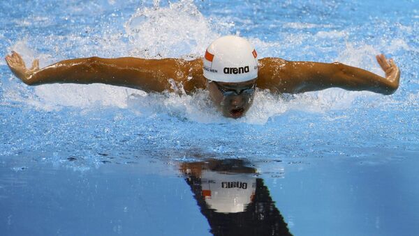 Спортсмен из Сингапура Куа Чжэн Вень во время полуфинала по плаванию на Олимпийских играх в Рио. Заплыв на 100 метров баттерфляем. - Sputnik Грузия