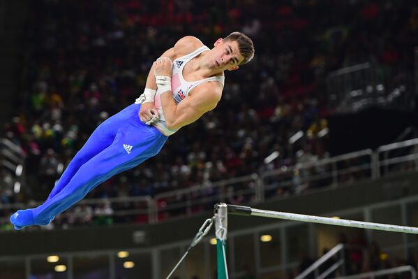 Гимнаст Макс Уитлок из Великобритании во время соревнований на Олимпийских играх-2016 в Рио-де-Жанейро - Sputnik Грузия