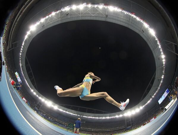 Прыгунья Ольга Рыпакова из Казахстана во время соревнований на XXXI летних Олимпийских играх в Рио-де-Жанейро - Sputnik Грузия