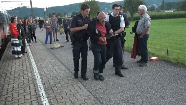 Нападение на поезд в Австрии: задержание преступника и помощь раненым - Sputnik Грузия
