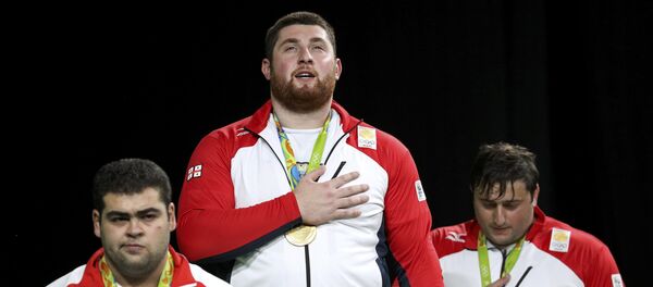 Тяжеловес из Грузии Лаша Талахадзе одержал победу на Олимпиаде в Рио - Sputnik Грузия