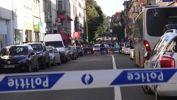 Женщина ранила трех пассажиров автобуса в Брюсселе. Видео с места ЧП - Sputnik Грузия