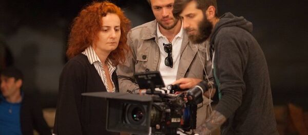 Режиссер Георгий Сихарулидзе во время съемок фильма Красные яблоки - Sputnik Грузия